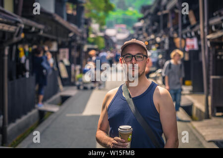 Takayama - May 26, 2019: Western travelers in the streets of Takayama, Japan Stock Photo