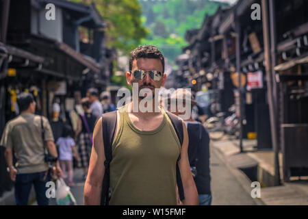 Takayama - May 26, 2019: Western travelers in the streets of Takayama, Japan Stock Photo