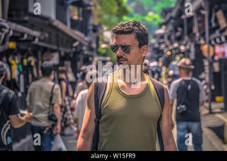 Takayama - May 26, 2019: Western travelers in the streets of Takayama, Japan Stock Photo