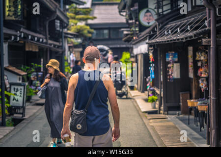 Takayama - May 26, 2019: Western travelers in the streets of Takayama, Japan Stock Photo