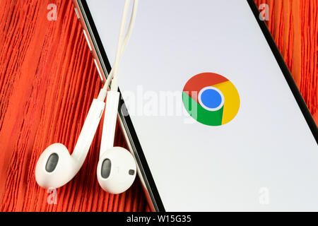 Helsinki, Finland, May 4, 2019: Google Chrome application icon on Apple iPhone X screen close-up. Google Chrome app icon. Google Chrome application. S Stock Photo