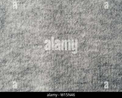 Gray sweater fabric texture. Clothes sweater background with folds Stock Photo