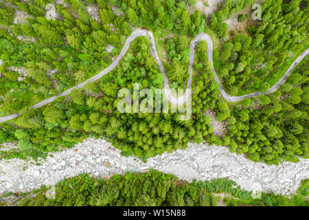 Amazing aerial view of windy road in a mountain valley, Switzerland Stock Photo
