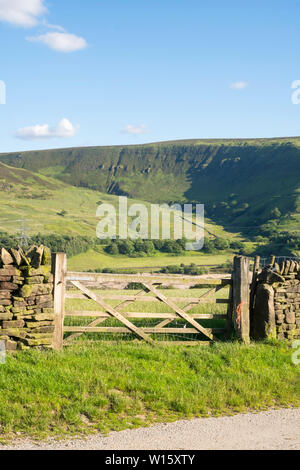 The Pennine Way runs above Torside Clough seen across the Longendale Valley in Crowden, Derbyshire, England, UK Stock Photo