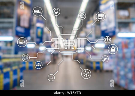 Retail marketing channels E-commerce Shopping automation concept on blurred supermarket background Stock Photo