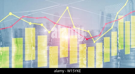 Yellow and red candles and charts on business technology background Stock Photo