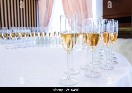 Champagne in the glases on the buffet table Stock Photo