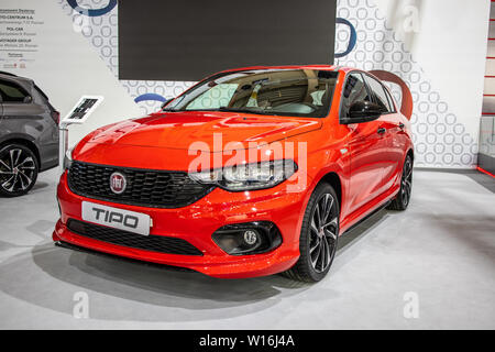 Poznan, Poland, March 2019: red Fiat Tipo Hatchback (5-door) at Poznan International Motor Show, manufactured and marketed by Fiat Stock Photo