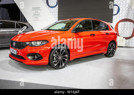 Poznan, Poland, March 2019: red Fiat Tipo Hatchback (5-door) at Poznan International Motor Show, manufactured and marketed by Fiat Stock Photo