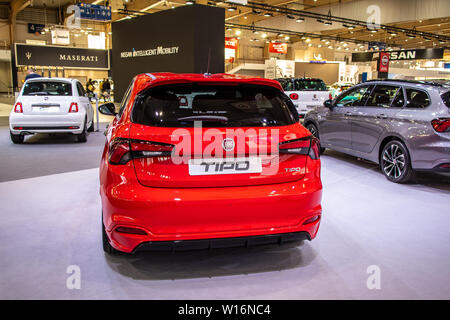 Poznan, Poland, March 2019: red Fiat Tipo Hatchback (5-door) at Poznan International Motor Show, manufactured and marketed by Fiat Stock Photo