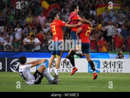 Udine, Italy. 30th June, 2019. Players of Spain celebrate after the 2019 UEFA European Under-21 Championship Final between Spain and Germany in Udine, Italy, June 30, 2019. Spain won 2-1. Credit: Alberto Lingria/Xinhua/Alamy Live News Stock Photo