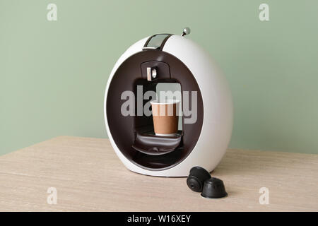 Modern coffee machine on table Stock Photo