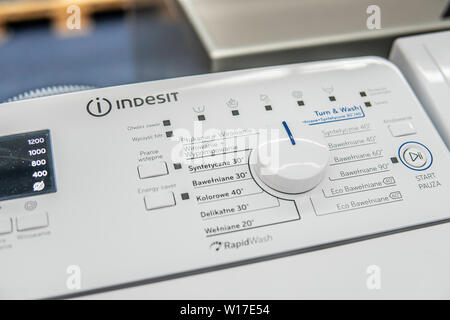 Lodz, Poland, July 2018 inside Saturn electronic store, free-standing Indesit washing machine on display for sale, control panel Stock Photo