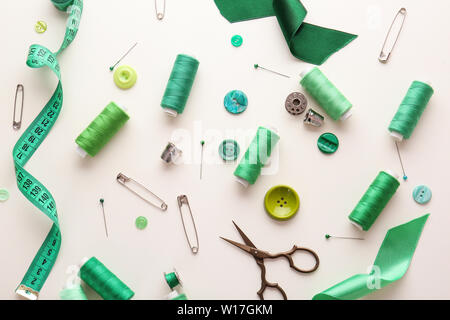 Set of sewing threads and accessories on white background Stock Photo
