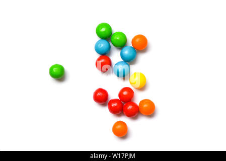 Colored candies / Colorful of small chocolates candy on white background , top view Stock Photo