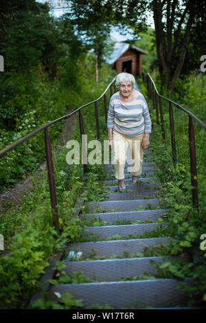 Single naked nude older woman walks in Cabo de Gata near Las Negras