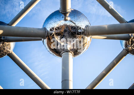 Brussels, Belgium, Jan 2019 Atomium, winter blue sky clouds, Atomium depicts nine iron atoms in shape of body-centred cubic unit cell of iron crystal Stock Photo