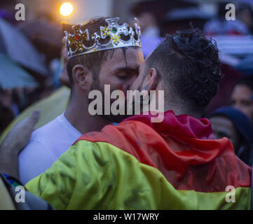 Bogota, Colombia. men kiss at the gay pride celebration in the city of