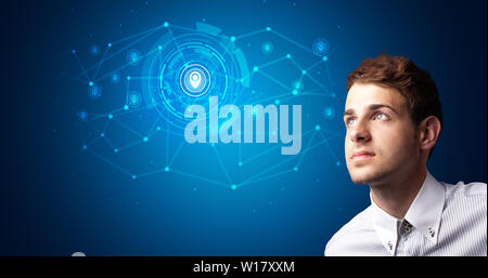 Man touching hologram screen displaying keys and locks Stock Photo