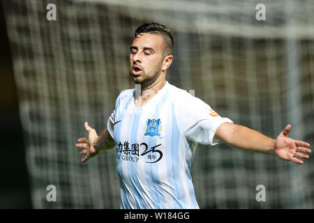 Israeli-Arab football player Dia Saba of Guangzhou R&F celebrates after scoring against Henan Jianye in their 15th round match during the 2019 Chinese Football Association Super League (CSL) in Guangzhou city, south China's Guangdong province, 29 June 2019. Guangzhou R&F defeated Henan Jianye 2-0. Stock Photo