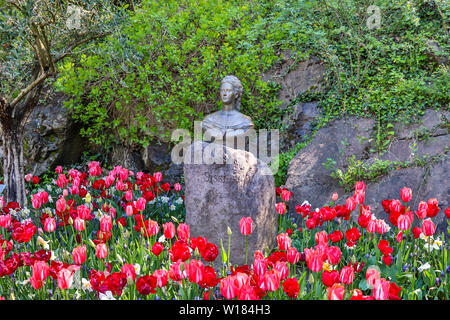 Monument of Queen and Empress Sissi or Sisi in flowerbed. Located in, Die Gärten von Schloss Trauttmansdorff, Province Bolzano, South Tyrol, Italy. Stock Photo
