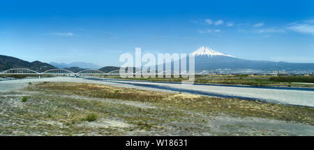 Distant View of Mount Fuji from bullet train, Japan Stock Photo