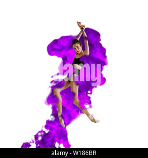 Creative collage formed by color dissolving in water on white background. Bright combination of colors. Young dancer in clouds of smoke or dissolves. Graceful, flexibility and elegance. Stock Photo