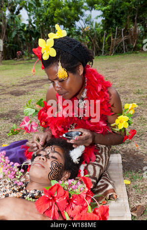 Demonstration of traditional Facial Tattoo, Tufi, Oro Province, Papua New Guinea Stock Photo