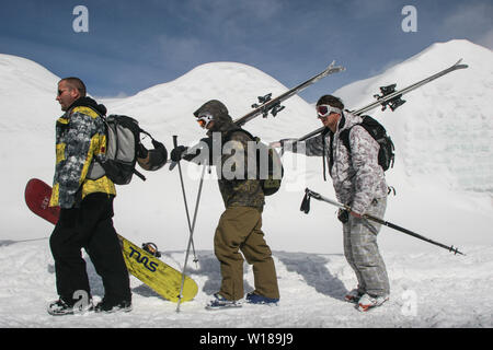 SIBIU, ROMANIA - March 13, 2010: Group of skiers and snowboarders at the Balea lake. Stock Photo