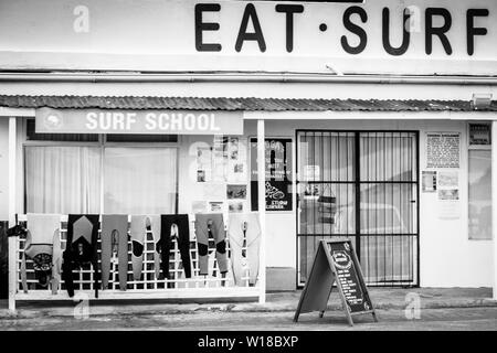 A surf school and hire business in Glencairn, that also serves conscious foods, on South Africa's Cape Peninsula coast line, near Cape Town Stock Photo