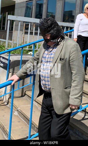 John Keogh, 74, leaves Croydon Magistrates Court in south London after he was fined ??600 for committing a racially aggravated offence on August 30 2018. Stock Photo
