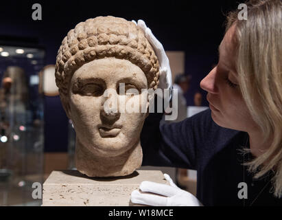 Bonhams, London, UK. 1st July 2019. Roman marble figures on display in the Antiquities sale preview, to be sold on 3 July 2019. Credit: Malcolm Park/Alamy Live News. Stock Photo