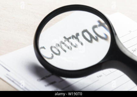 Magnifying Glass and document close up Stock Photo