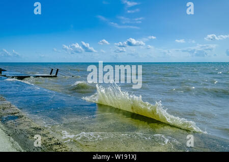 Splashing wave on the Black sea in the day. Stock Photo