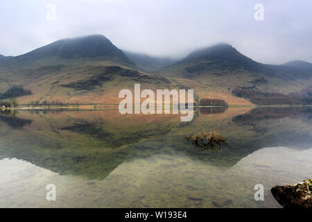 Mist view over Buttermere, Lake District National Park, Cumbria, England, UK Stock Photo