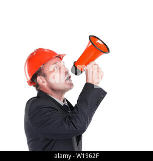 serious engineer with a screaming megaphone. Stock Photo