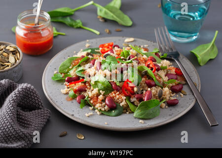 healthy bean and quinoa salad with spinach, chili Stock Photo