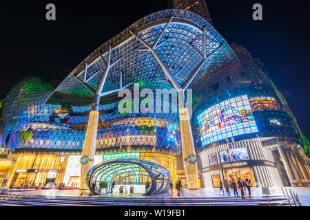 ORCHARD ROAD, SINGAPORE - JANUARY 6, 2019 : Singapore night city skyline at ION Orchard shopping mall Stock Photo