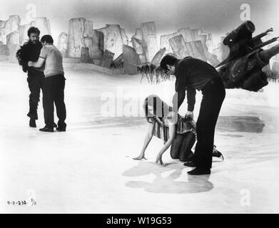 UGO TOGNAZZI as Mark Hand JANE FONDA as BARBARELLA on set candid filming with director ROGER VADIM 1968 author Jean-Claude Forest  Marianne Productions / Dino de Laurentiis Cinematografica / Paramount Pictures Stock Photo