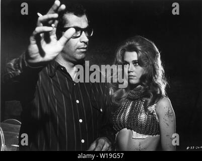 Director ROGER VADIM on set candid filming with JANE FONDA as BARBARELLA 1968 author Jean-Claude Forest  Marianne Productions / Dino de Laurentiis Cinematografica / Paramount Pictures Stock Photo