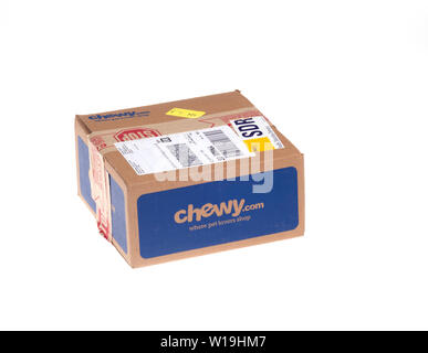 Chewy pet supplies box delivered via FedEx Home delivery on white