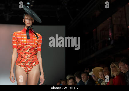 Berlin, Germany. 01st July, 2019. A model presents the fashion of the designer Danny Reinke in the E-Werk. The collections for Spring/Summer 2020 will be presented at Berlin Fashion Week. Credit: Monika Skolimowska/dpa/Alamy Live News Stock Photo