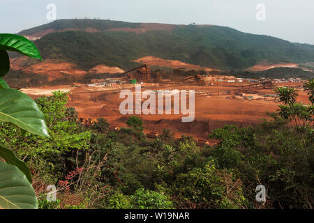 Mining operations for transporting and managing iron ore. Stock piles & loading rail train trucks, process plant & construction of new workshops left. Stock Photo