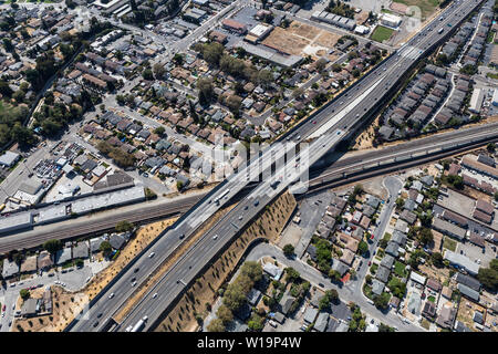 Aerial view of streets, buildings and traffic along the 238 freeway railroad overpass near Oakland California. Stock Photo