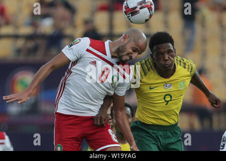 Cairo, Egypt. 01st July, 2019. South Africa's Lebo Mothiba (R) and Morocco's Karim El Ahmadi battle for the ball during the 2019 Africa Cup of Nations Group Group D soccer match between South Africa and Morocco at Al-Salam Stadium. Credit: Oliver Weiken/dpa/Alamy Live News Stock Photo