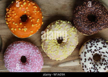 close up of different flavors of donuts Stock Photo