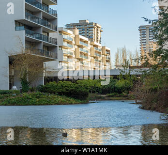 Small pond and recreational area in urban environment  Stock Photo