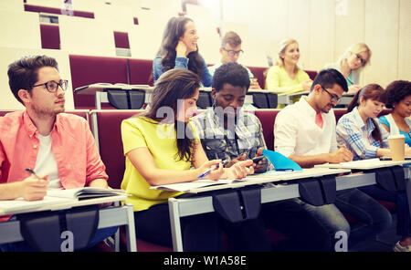 group of students with smartphone at lecture Stock Photo