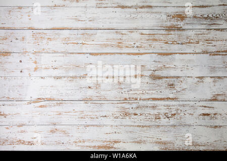 White wooden floorboards. Distressed worn floorboard background painted white Stock Photo
