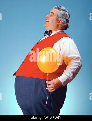 Fat man with a balloon Stock Photo
